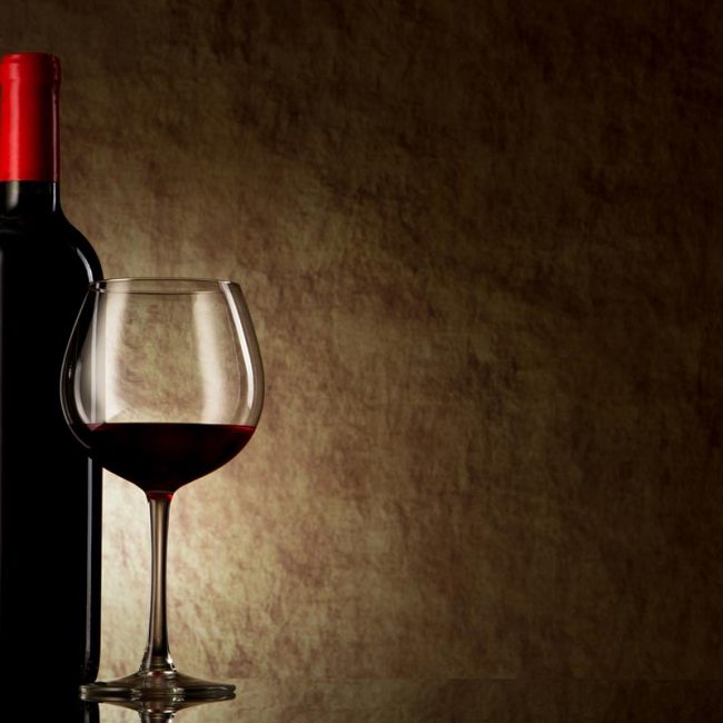 photodune-1930437-bottle-with-red-wine-and-glass-on-a-old-stone-m photodune-1930437-bottle-with-red-wine-and-glass-on-a-old-stone-m